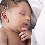 Real People: Sleeping Baby Boy African American Head Shoulders